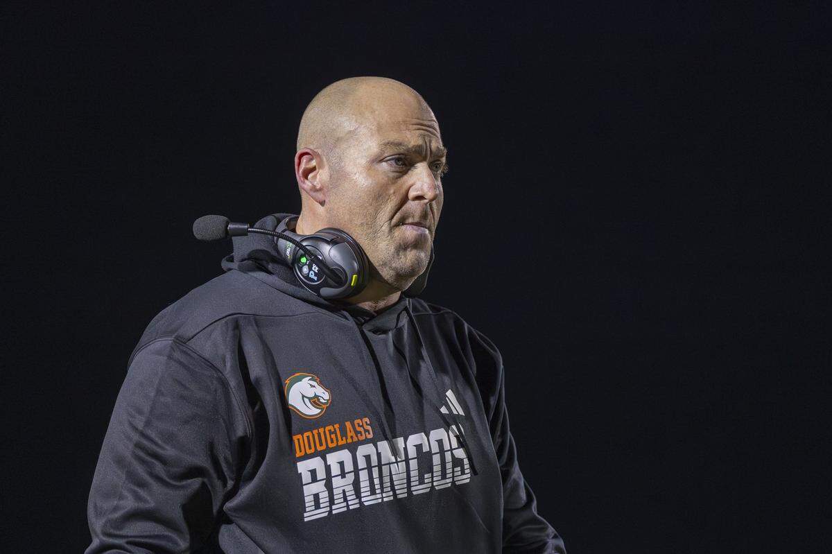 Frederick Douglass head coach Nathan Mcpeek is photographed on the sideline during a game against Madison Central in Lexington, Ky., on Friday, Oct. 10, 2025.