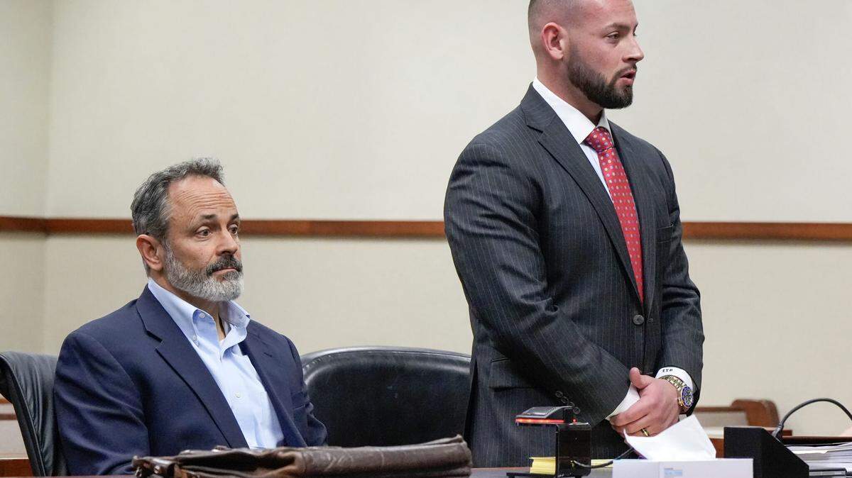 Former Kentucky Governor Matt Bevin appears in Family Court on Tuesday, March 25, with attorney Zach Buckler as part of a hearing concerning an emergency protective order sought by his son, Jonah Bevin, against the former governor and former First Lady Glenna Bevin.