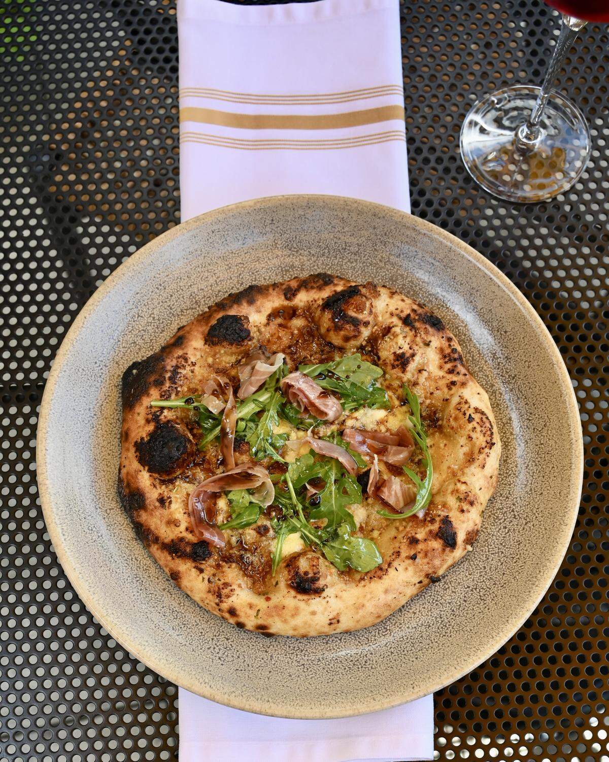 For Lexington Pizza Week, Crust will serve up this pizza with fig jam, gorgonzola, country ham, arugula, balsamico.