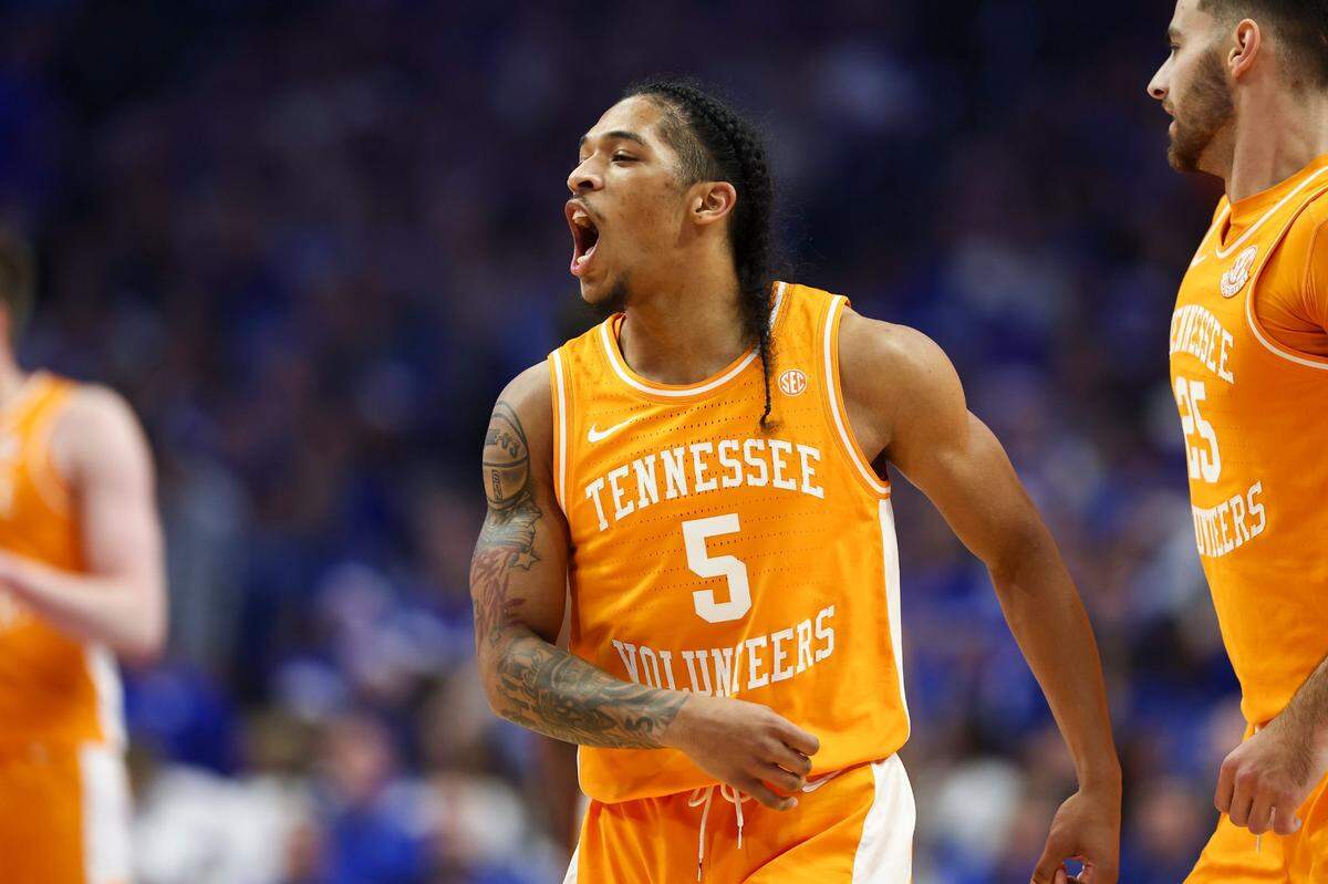 Tennessee’s Zakai Zeigler (5) celebrates scoring against Kentucky during their game in Rupp Arena last season.
