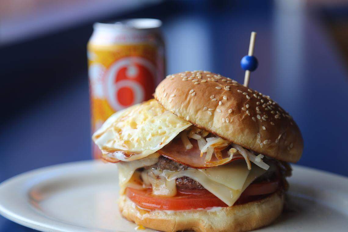 In 2018, Tolly Ho debuted its Lexington Burger Week offering, the Hungover Ho. It was two quarter-pound patties seasoned with a cinnamon chipotle spice topped with Ho Sauce, lettuce, two slices of Swiss, four pieces of Canadian Bacon, hash browns, an over medium-well egg and bourbon honey sauce.