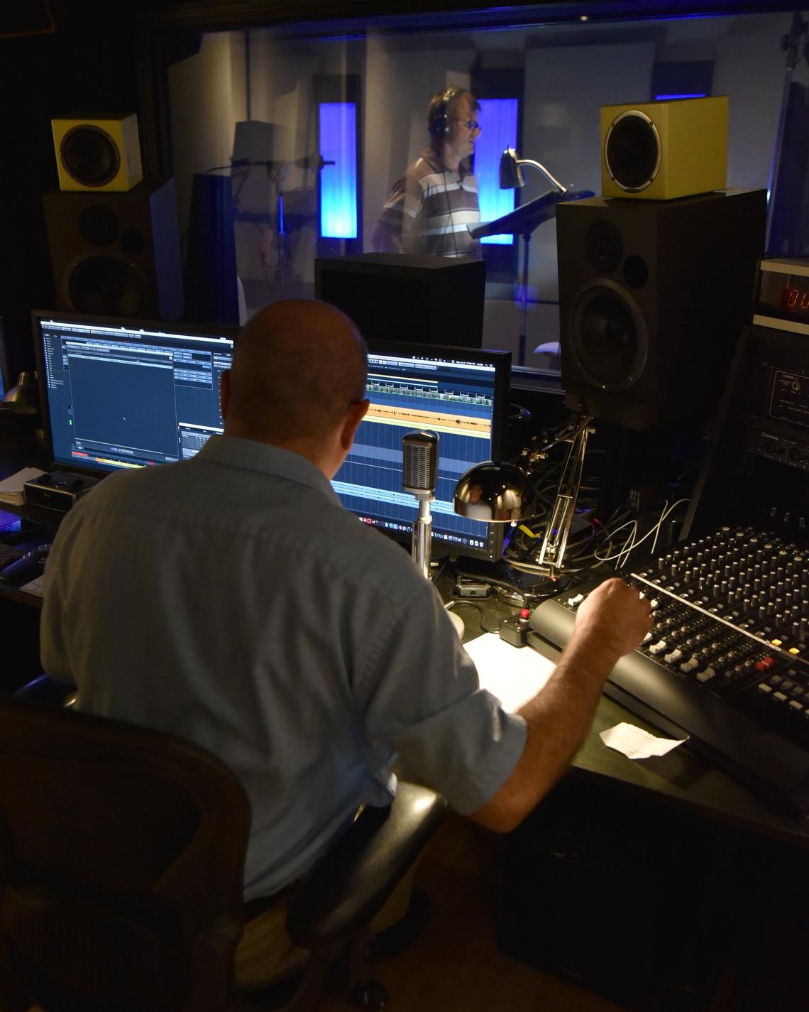 Neil Kesterson operates the controls as actor Steve Zahn does post-production voice work for the National Geographic series “Valley of the Boom” at Dynamix Productions in Lexington, Kentucky on July 9, 2018.