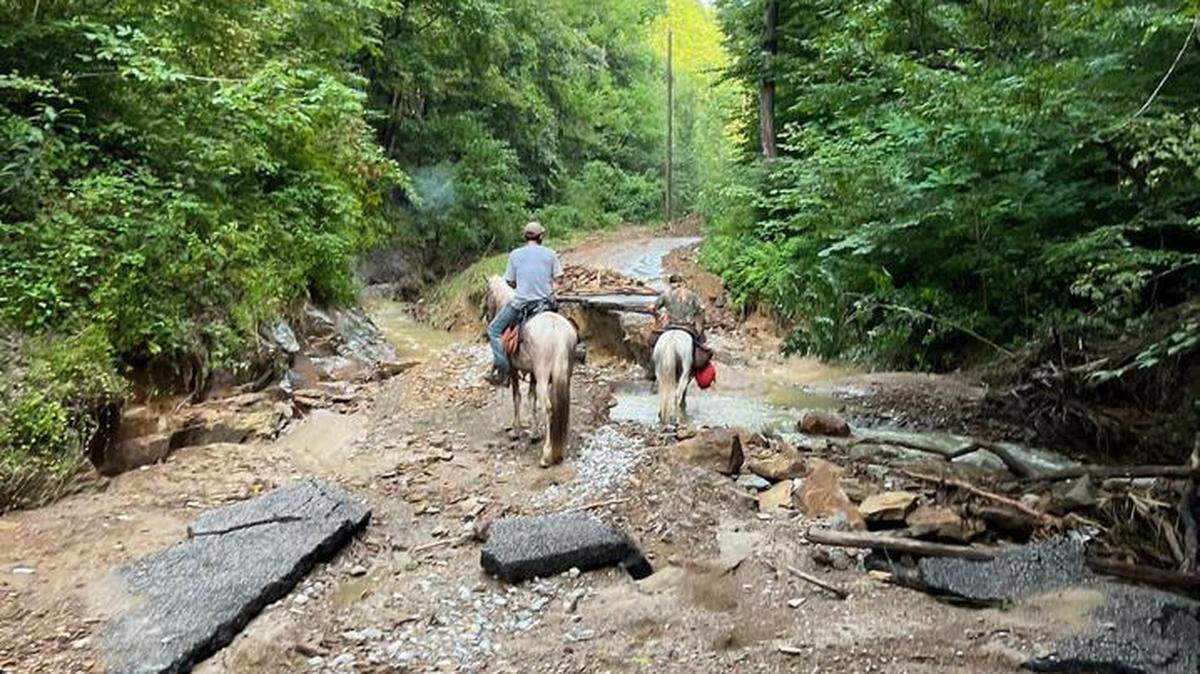 The Breathitt County Horseman’s Association, part of UK extension service, went on horseback to help flood victims in July. Photo courtesy of Hunter Stidham.