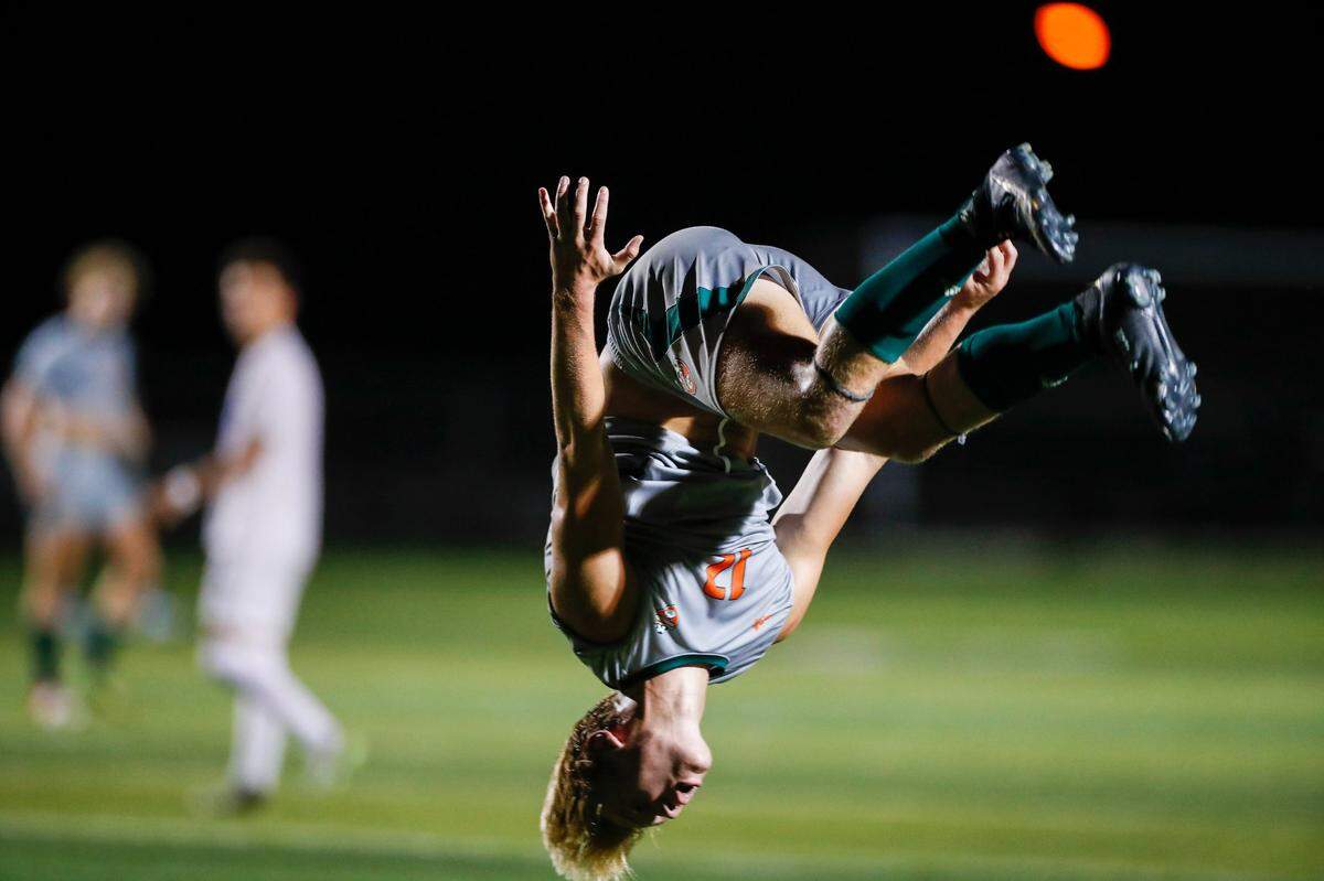 Cooper Ranvier of Frederick Douglass celebrates with a backflip after scoring one of his two second-half goals in a 4-1 Broncos win over Henry Clay on Tuesday night.
