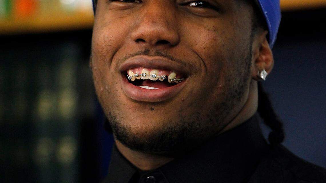 Ryan Timmons spoke to media after he announced he would play football for Kentucky during a school rally at Franklin Co. High School in Frankfort, Ky., on Feb. 5, 2013.  Photo by Pablo Alcala | Staff