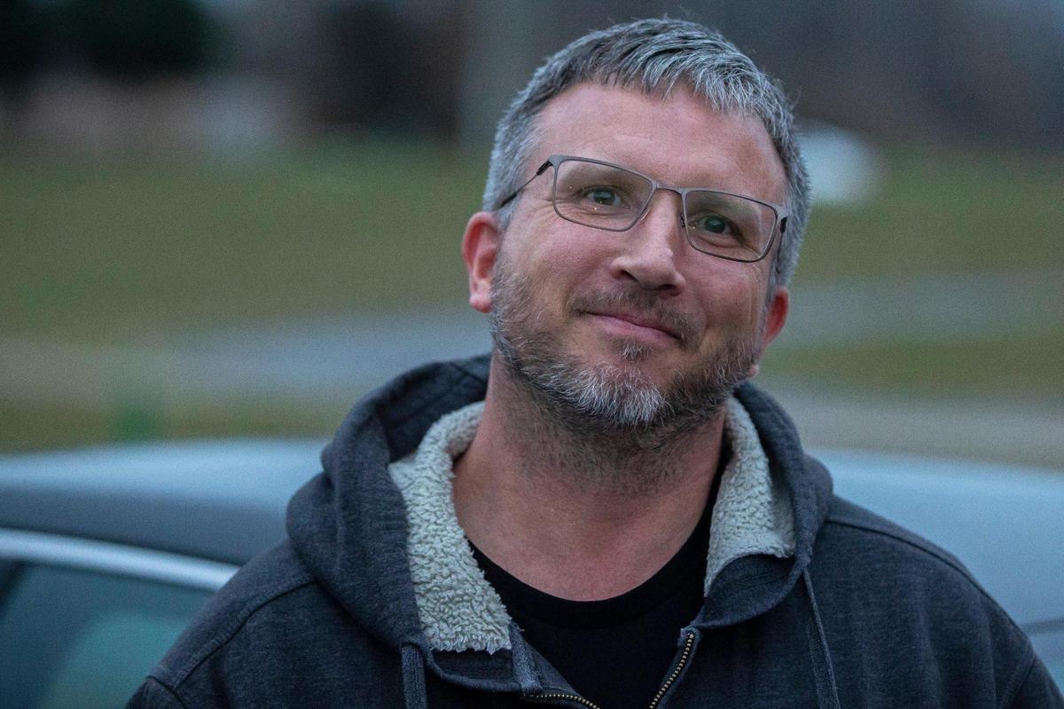 Dave Mcalpine poses for a portrait outside Liberty Elementary School in Lexington, Ky., on Tuesday, March 15, 2022, the first day masks were optional in Fayette County Public Schools.