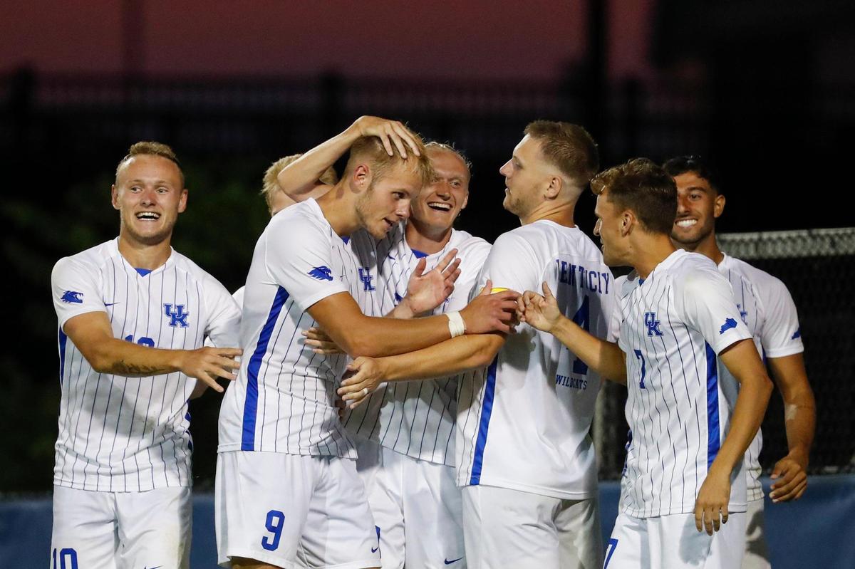 Kentucky forward Eythor Bjorgolfsson (9) celebrates heading the ball into the net for one of the Wildcats’ two goals in Thursday night’s season opener in Lexington.
