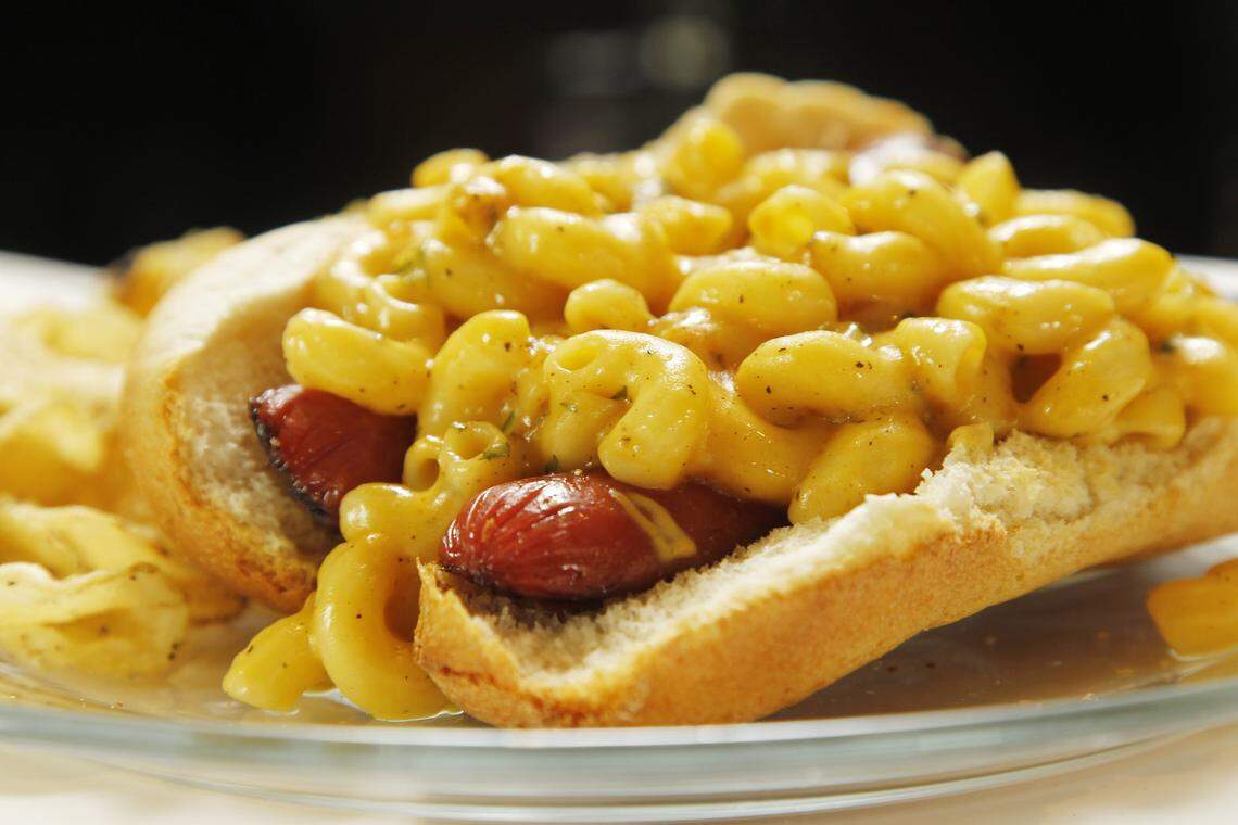 The Little Brother is a pan-fried smoked sausage on a bun, topped with mac and cheese.