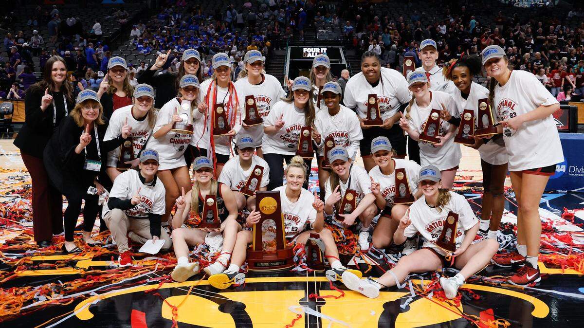 The Transylvania women’s basketball team poses for a photo after winning the NCAA Division III Tournament championship game on Saturday at the American Airlines Center in Dallas.