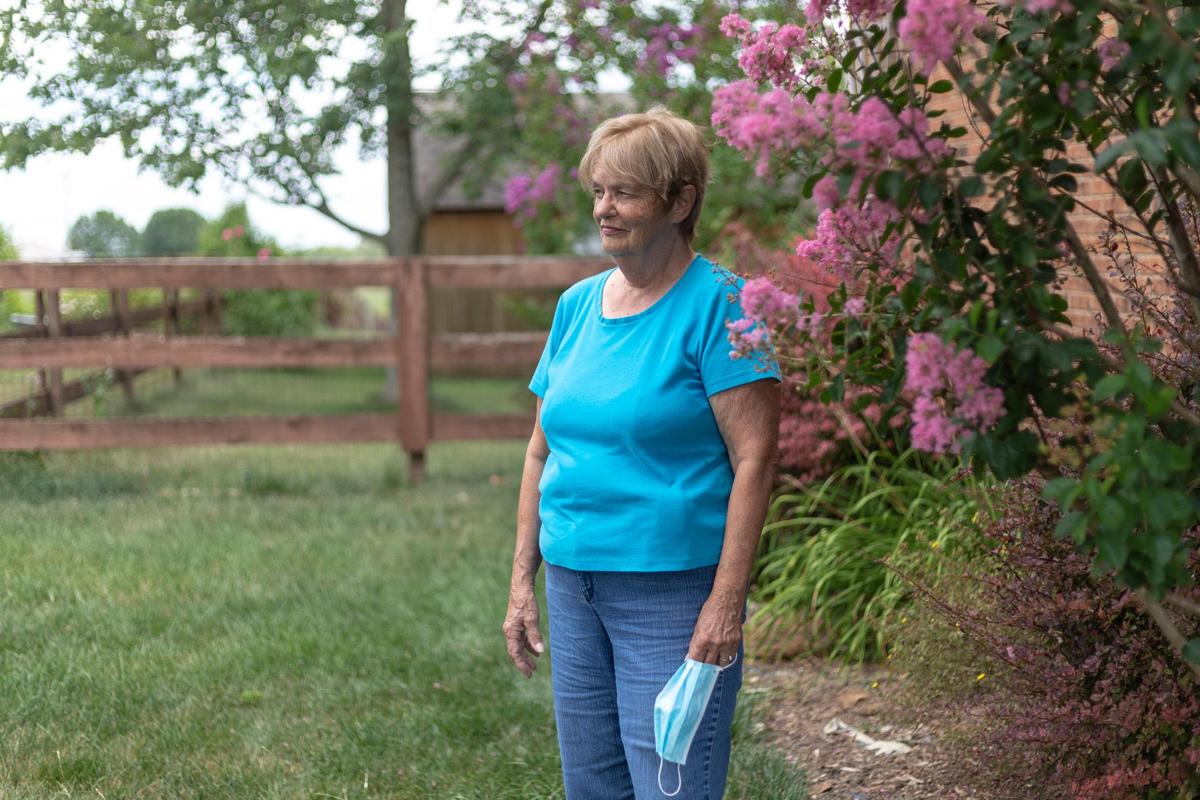 Sharon Slone poses for a portrait outside her home in Richmond, Ky., Tuesday, July 27, 2020. Slone recently went back to her job at a gas station after her unemployment did not go through. Slone lives with her daughter, April Payne, both have medical complications like diabetes in addition to immune compromising conditions making them high risk to catch the novel coronavirus. Without receiving unemployment insurance benefits Slone has had to return to work in order to afford food and medication, but she fears that she will have to quit work again if the rate of the virus rises any more. “I don’t have anything else I can quit paying for,” Slone said.