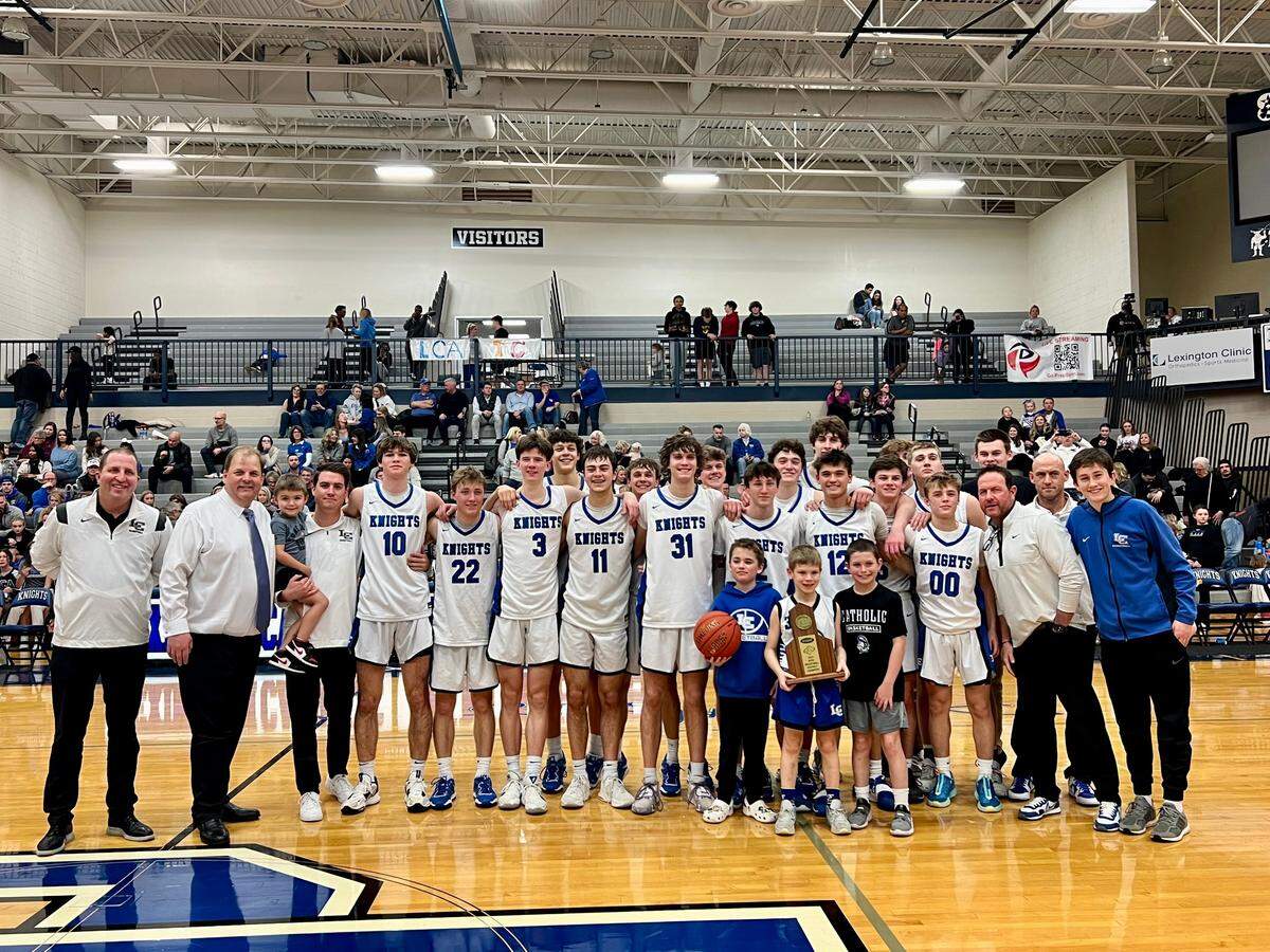 Lexington Catholic boys’ basketball wins its second-consecutive District Championship in Friday’s 61-39 victory over LCA.