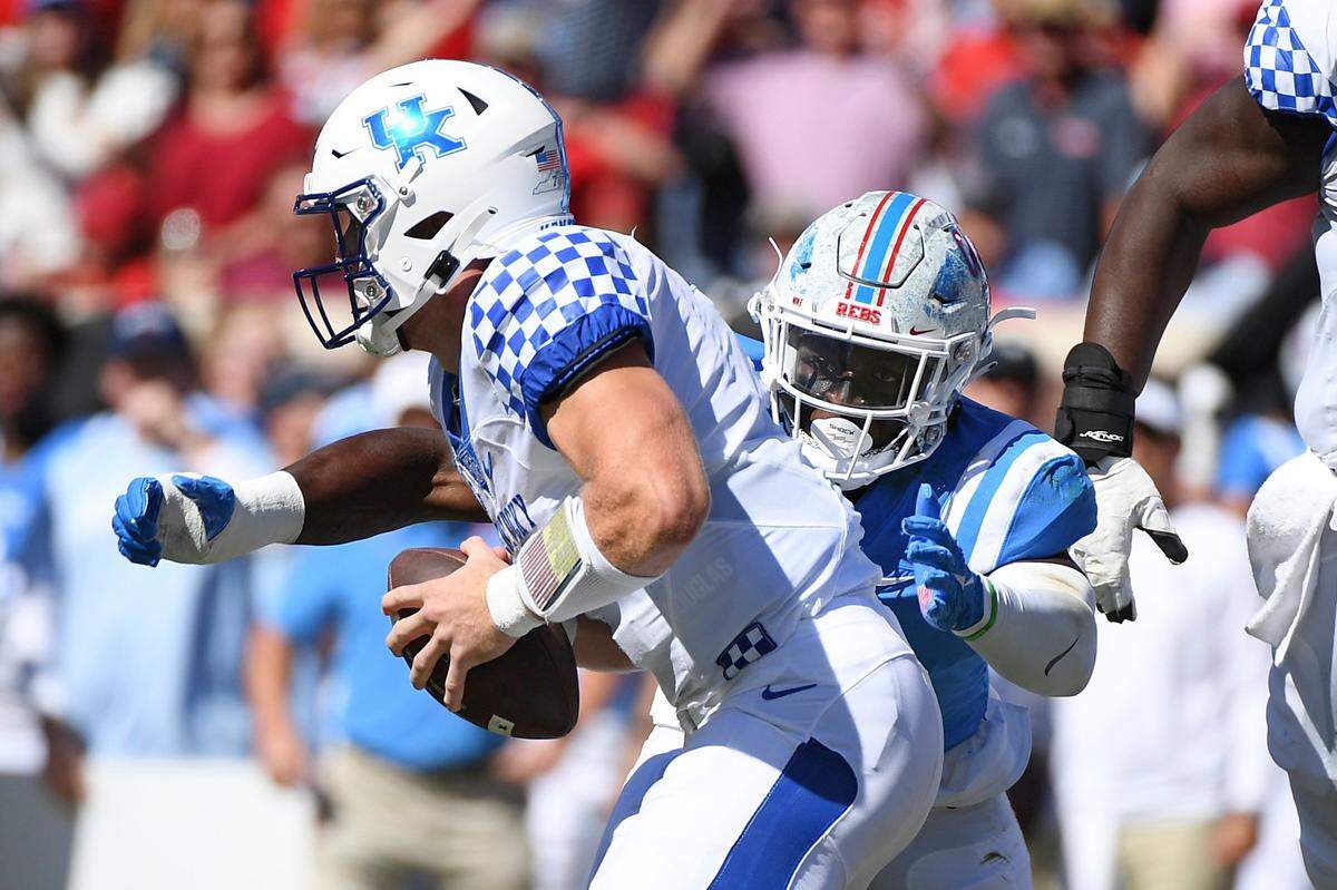 Mississippi linebacker Austin Keys (11) sacks Kentucky quarterback Will Levis (7) during the first half of an NCAA college football game in Oxford, Miss., Saturday, Oct. 1, 2022. (AP Photo/Thomas Graning)