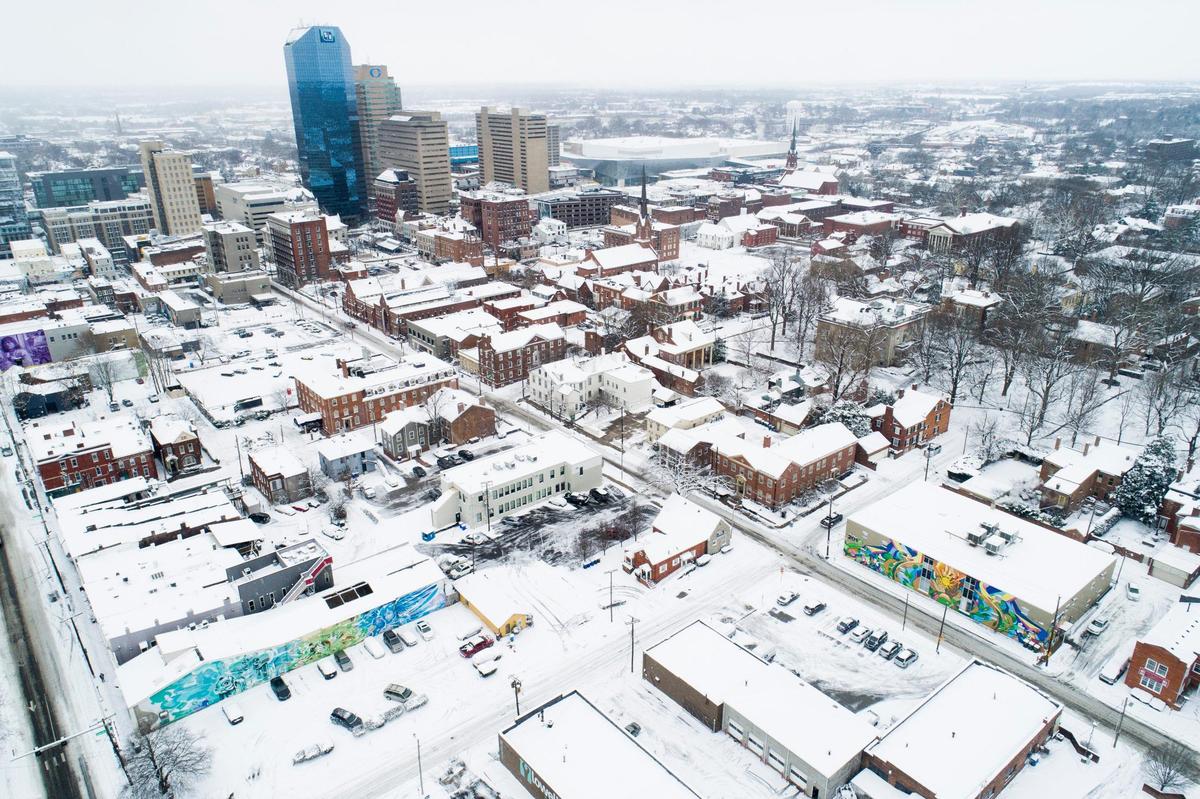 Downtown Lexington sits under a blanket of snow following Thursday’s history accumulation, Friday, Jan. 7, 2022. in Lexington, Ky., Friday, Jan. 7, 2022.