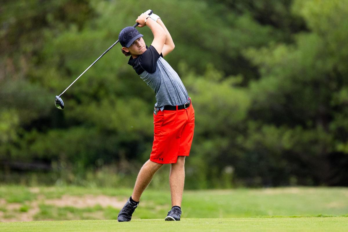 Taylor County’s Luke Coyle watched his tee shot during the KGCA All State Championships on Sunday at the University Club of Kentucky. He won the boys’ individual title by four shots.