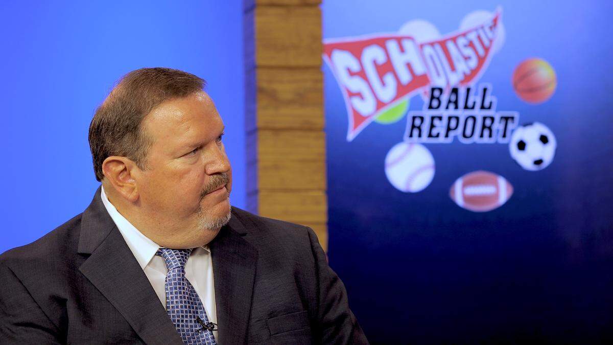 Producer Gary Ball interviewed a guest for “Scholastic Ball Report.”