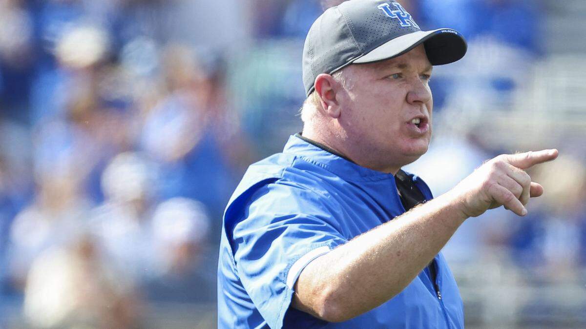 Kentucky head coach Mark Stoops watches his team play against Ole Miss on Saturday at Kroger Field.