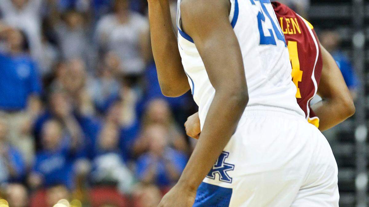 Kentucky Wildcats guard Doron Lamb (20) flashed the three signal after hitting one for some of his 16 points as #1 Kentucky defeated  Iowa State 87-71 on Saturday  March 17, 2012 in Louisville, Ky. Photo  by Mark Cornelison | Staff