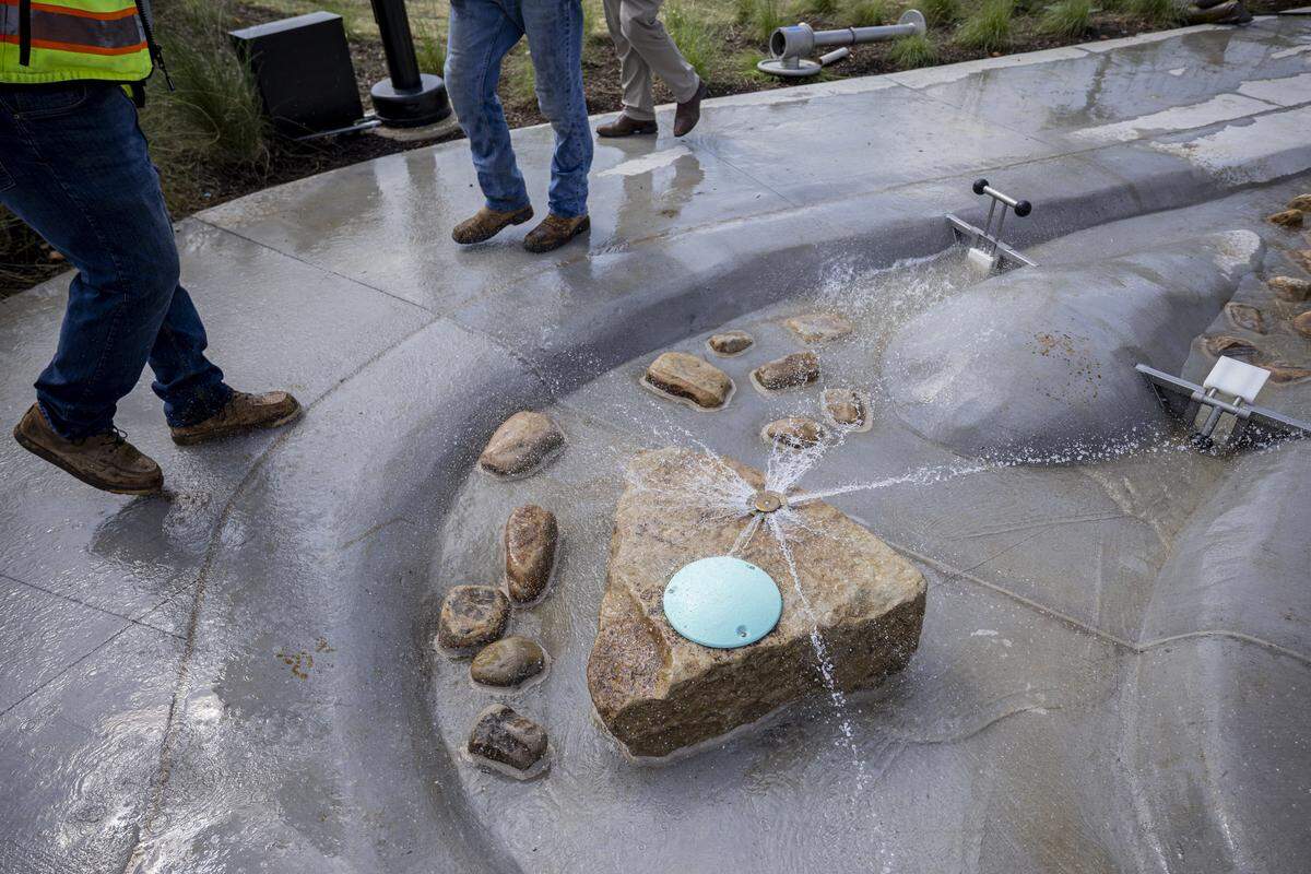 The water play area, made of limestone channels and stones where people can interact with the water during a tour on Thursday, Aug. 14, 2025, at Gatton Park on the Town Branch in Lexington, Ky. 
