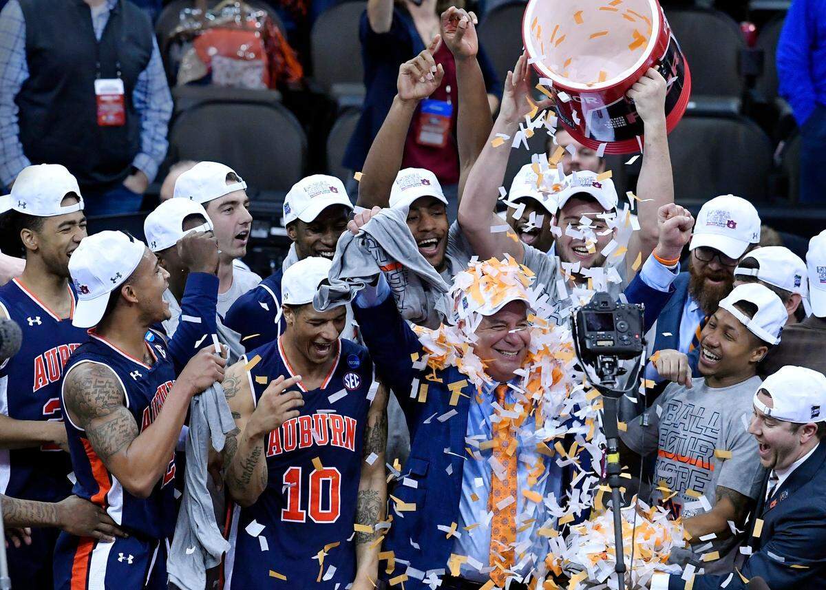 Auburn Coach Bruce Pearl was covered in confetti after the Tigers defeated Kentucky in the championship game of the NCAA Tournament Midwest Regional in 2019. Auburn’s Final Four run began with four victories in four days at the SEC Tournament.