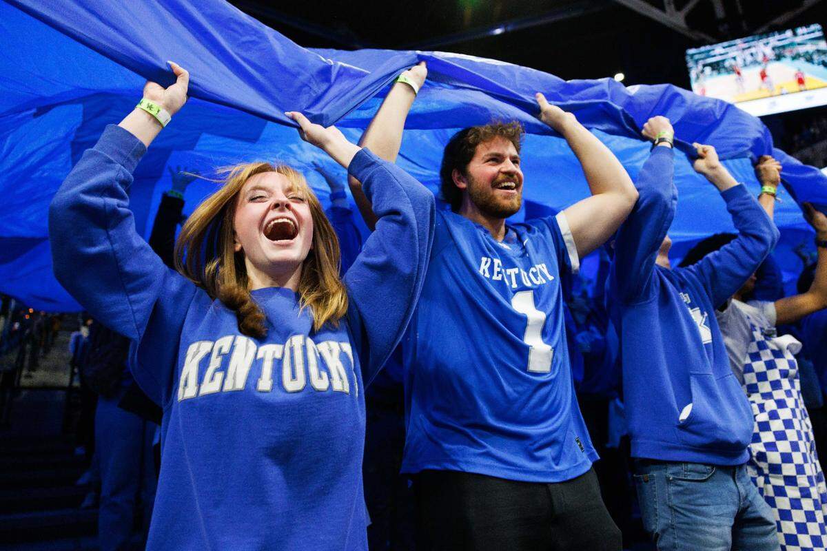Feb 8, 2025; Lexington, Kentucky, USA; Kentucky Wildcats fans wave a flag above the eRUPPtion zone before the game against the South Carolina Gamecocks at Rupp Arena at Central Bank Center. Mandatory Credit: Jordan Prather-Imagn Images