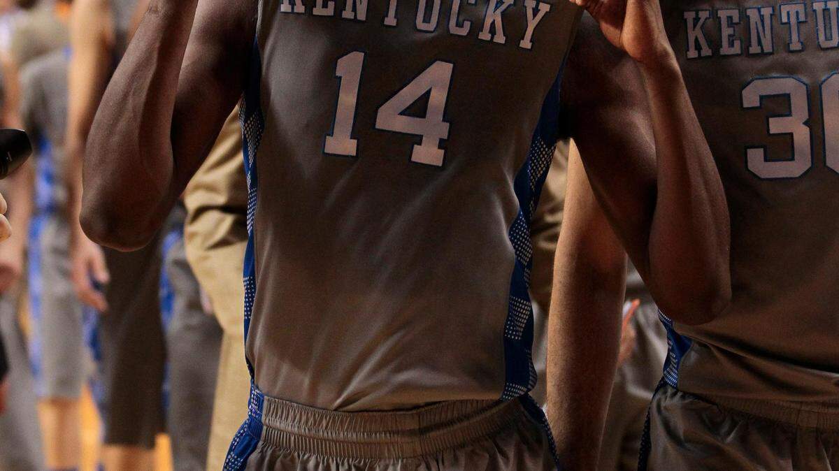 Michael Kidd-Gilchrist showed his Kentucky pride after Kentucky defeated Tennessee on Jan. 31.  Photo by Mark Cornelison | Staff