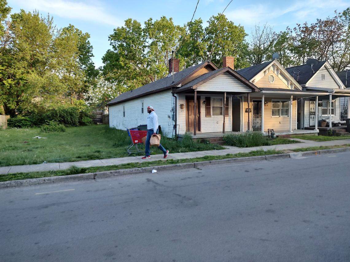 Devine Carama, director of One Lexington, delivered bags of produce to residents on Chestnut Street on May 4, 2023.