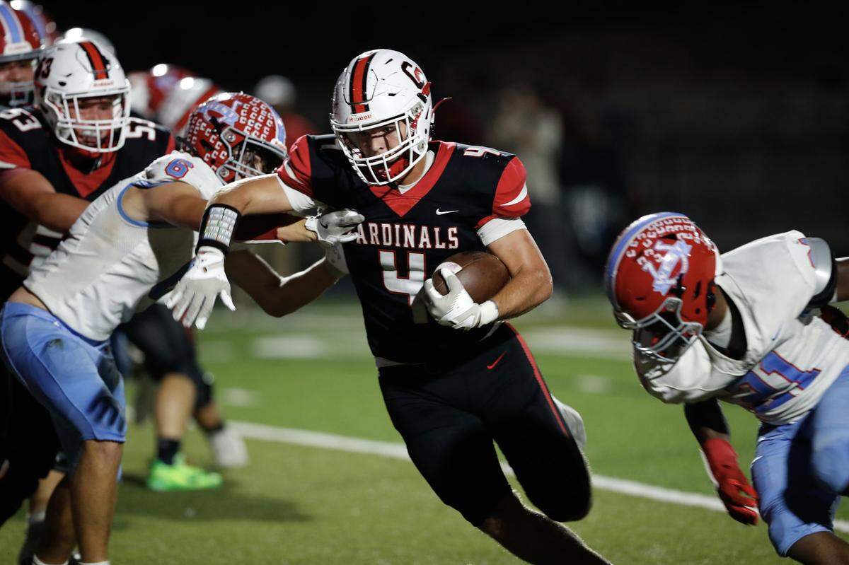 George Rogers Clark’s Stryker Davidson (4) broke through the West Jessamine defense in the first half of the Cardinals’ 35-21 win at George Rogers Clark High School in Winchester on Friday.