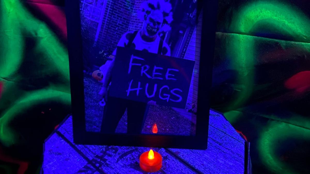 A photo of Ty Abner in his “Tiggles the Clown” costume was displayed on a barrel inside the haunted house he designed in his garage.