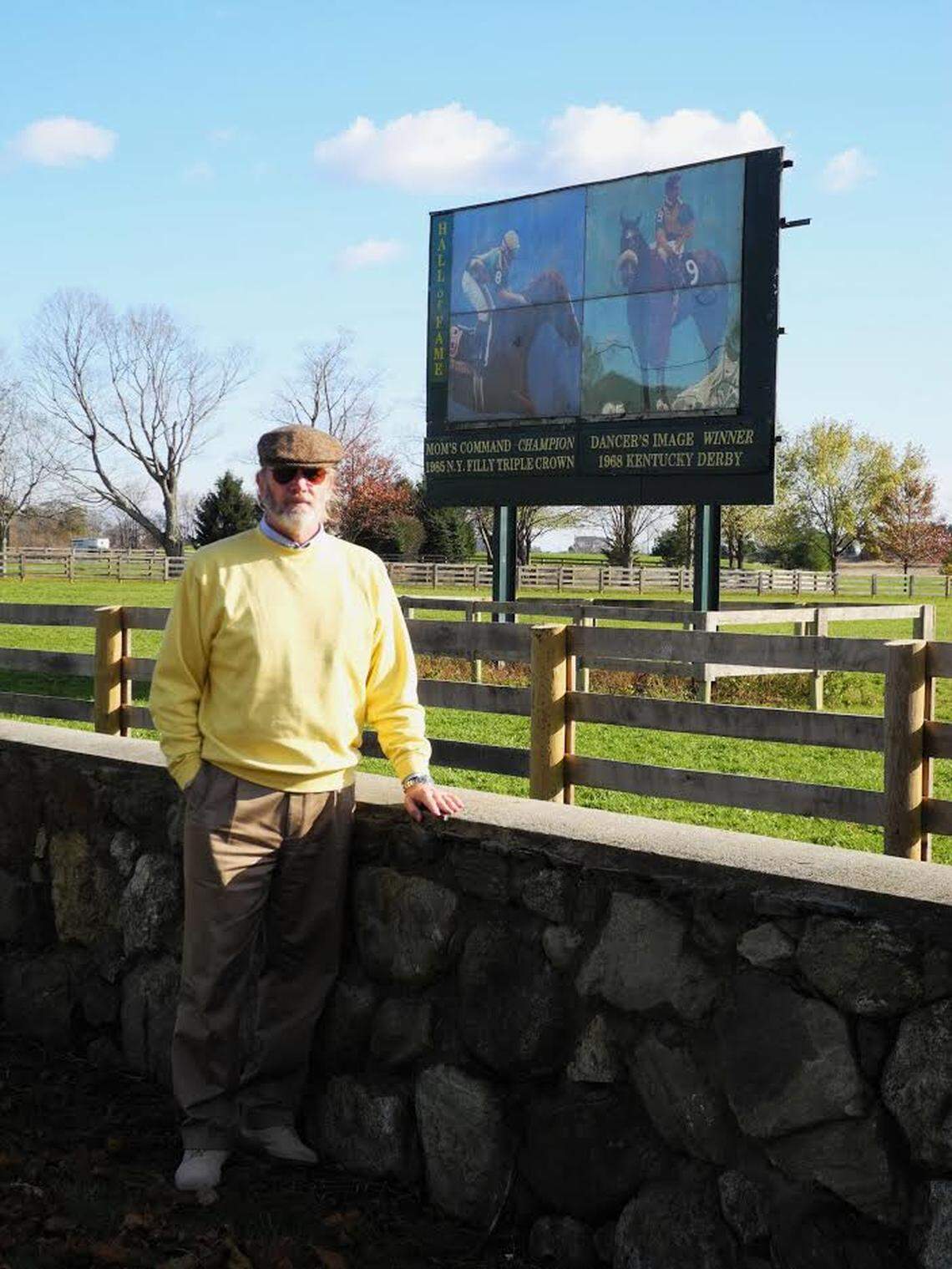 Author Milton C. Toby stood in front of a billboard that horse owner Peter Fuller put up at his New Hampshire farm that celebrated the victory of Fuller’s horse, Dancer’s Image, in the 1968 Kentucky Derby that was ultimately taken away via disqualification.