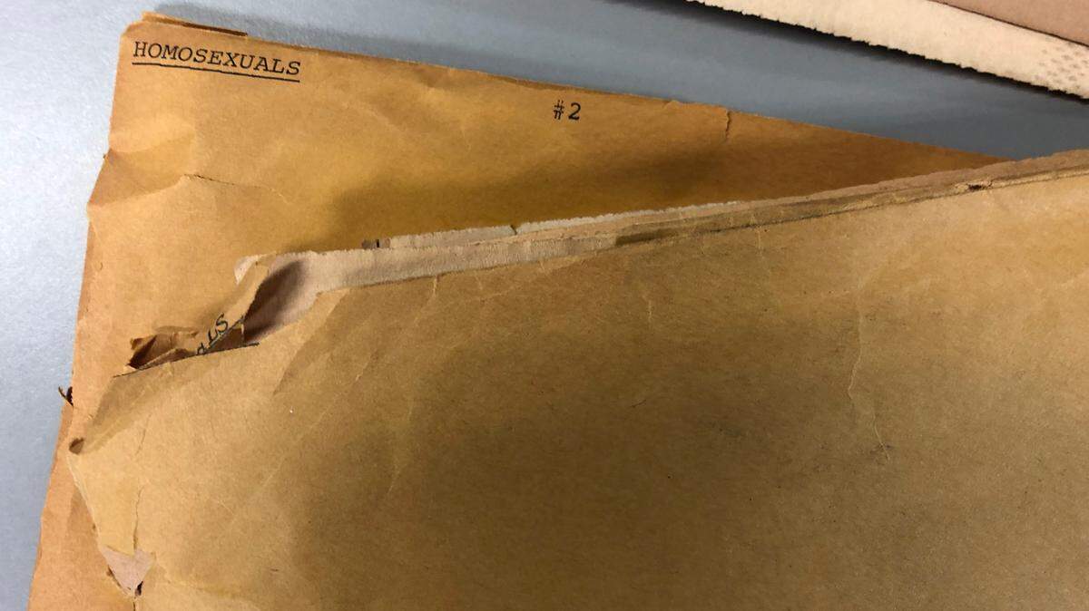 Two folders from the Herald-Leader archives, labeled “Homosexuals #1” and “Homosexuals #2.” The clips range from 1975 to the mid 1980s.