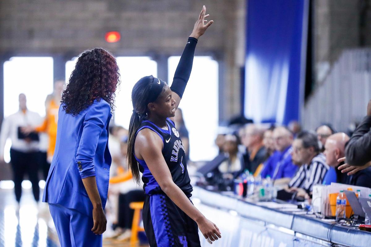 Kentucky guard Robyn Benton (1) waves to fans while coming out of the game against Tennessee at Memorial Coliseum on Sunday.