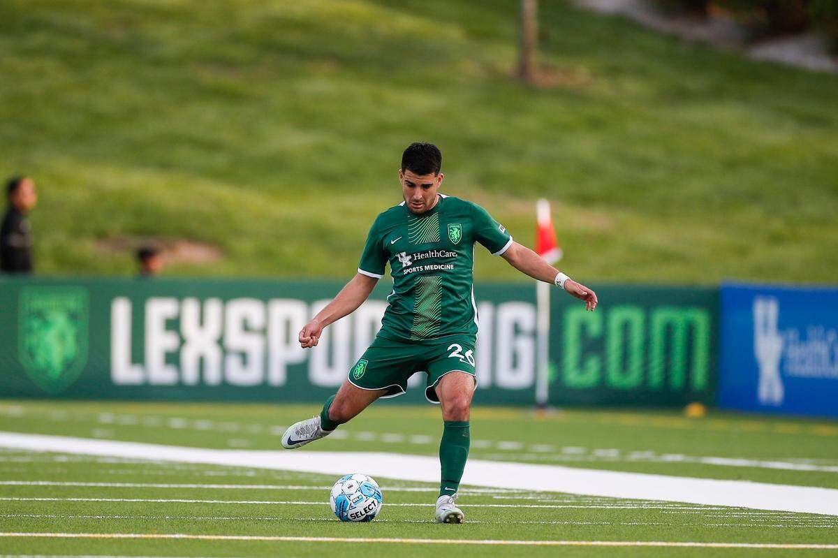 Lexington Sporting Club’s Cesar Murillo Jr. passes the ball during the team’s inaugural match at Toyota Stadium in Georgetown, its temporary home this season. “My client, all things being equal, wants to have the stadium in Lexington,” said Stephen Ruschell, a lawyer for the developers.