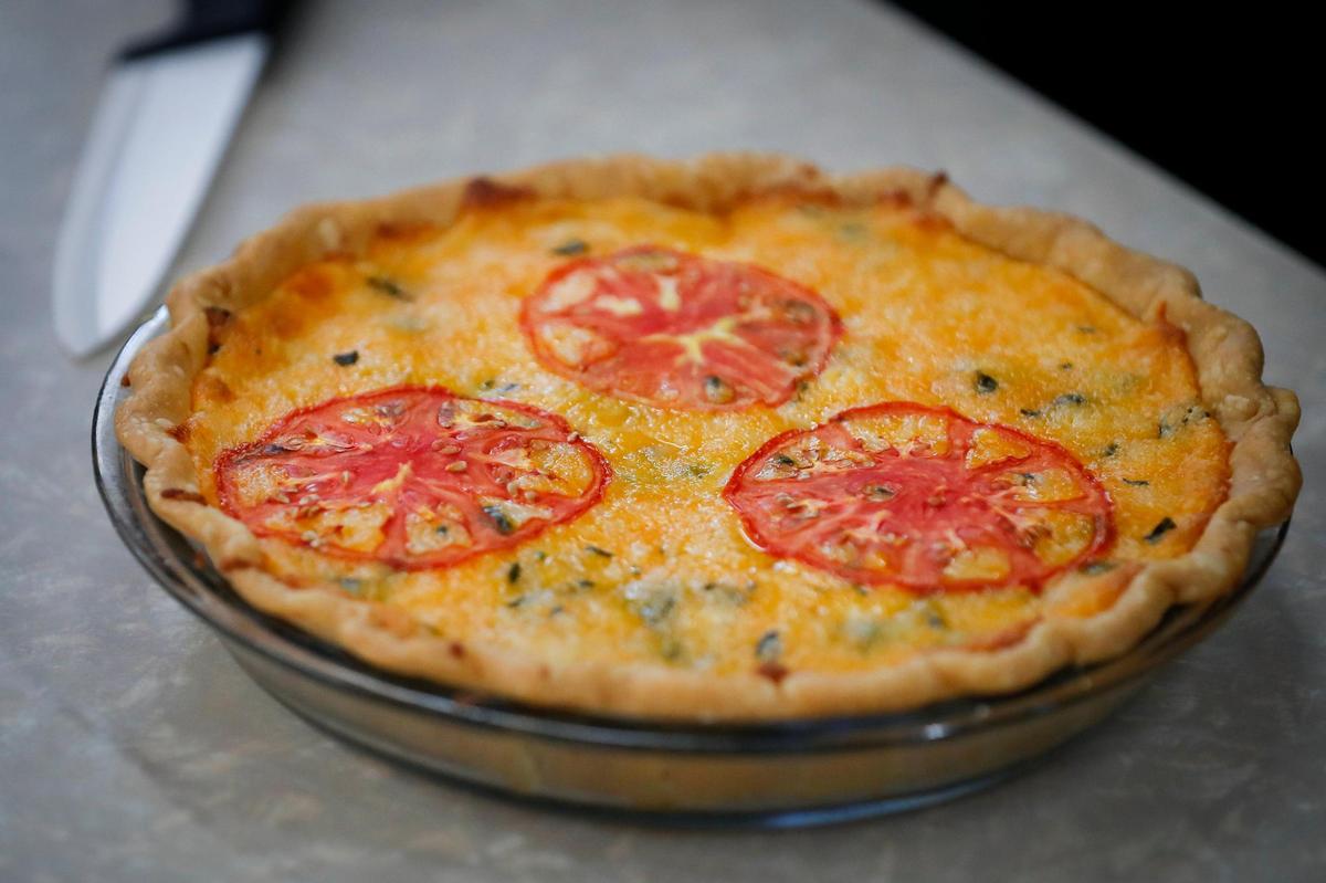 The seasonal tomato pie made with local tomatoes, fresh basil, eggs and cheese baked in a pie crust at Lil’s Coffee House in Paris.