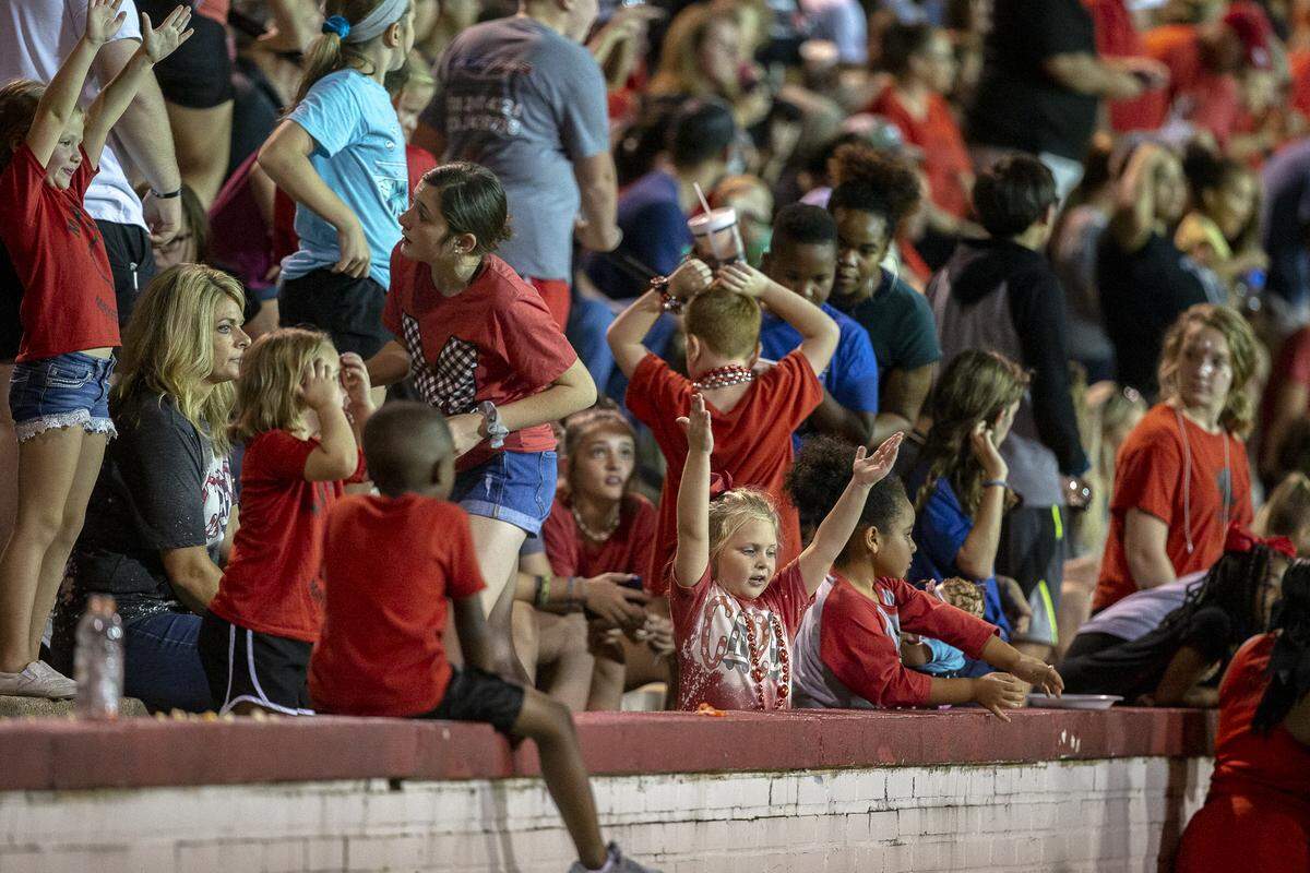Fans of all ages watch the rivalry game between Mayfield and Graves County.