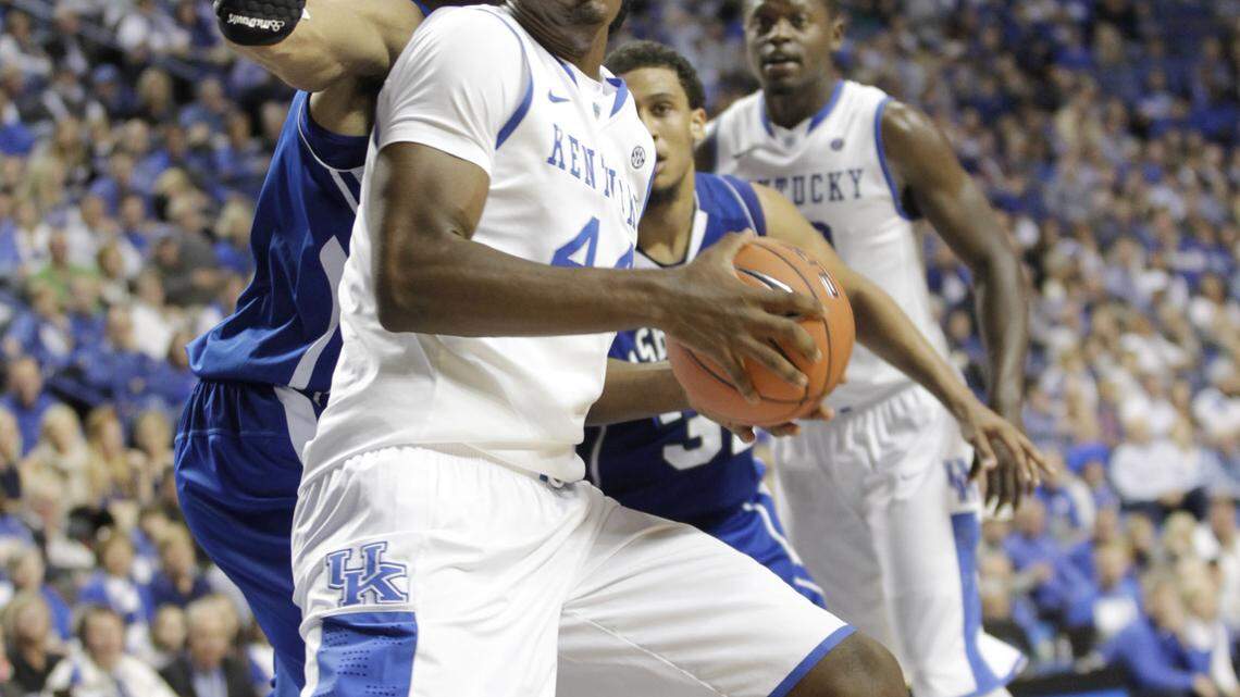 Kentucky's Dakari Johnson grabbed a rebound against UNC-Asheville. Johnson said he needs to improve his defense.  