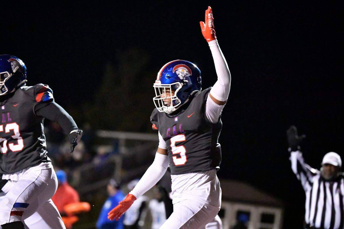 Christian Academy’s Stone Perkins (5) celebrates after returning a first-half interception for a touchdown on Friday night.