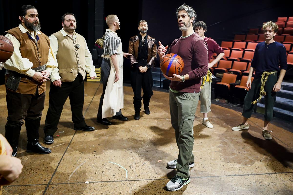 Director Evan Bergman speaks with the cast before rehearsal for “Peter and the Starcatcher”. The play opens Friday