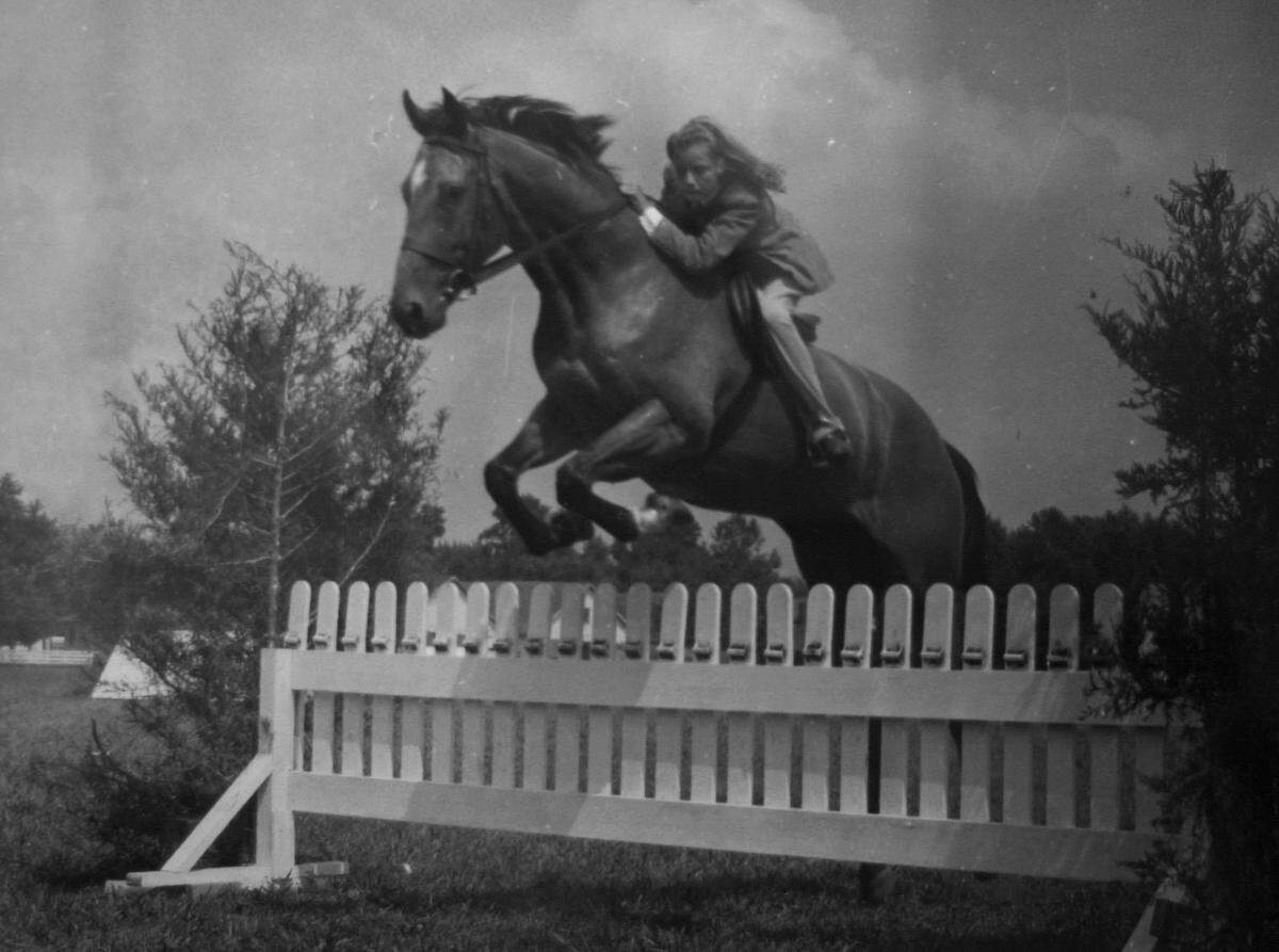Alice Chandler, the owner of Mill Ridge Farm, riding when she was 11 years-old. Her family line, which can be traced back to the days of Daniel Boone, has been in the horse business since the 1800’s.