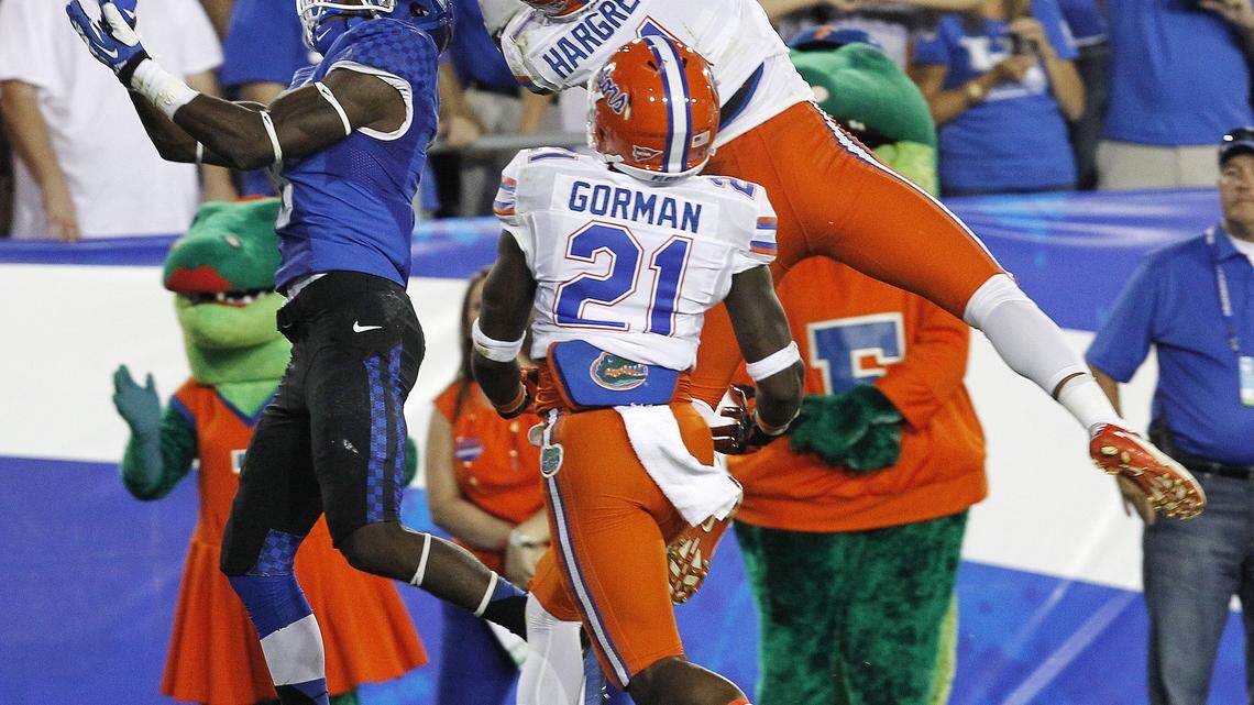Florida cornerback Vernon Hargreaves intercepts a pass intended for Kentucky wide receiver Javess Blue last September in Lexington. Florida won that game, 24-7.