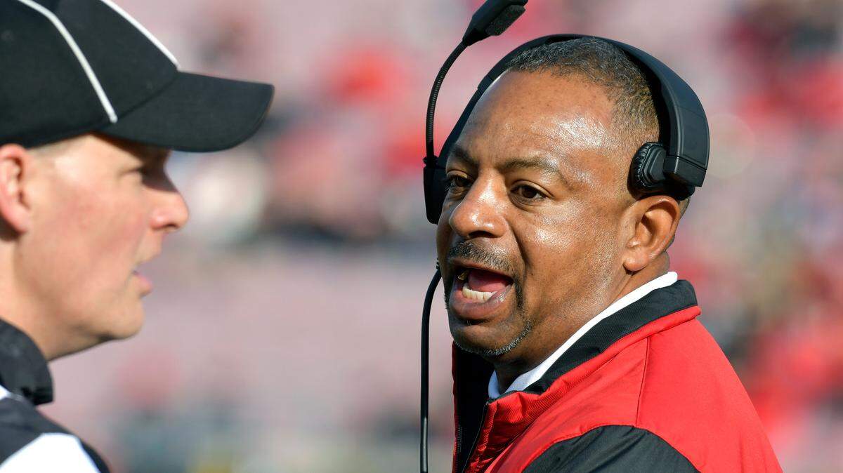 With the ouster of Bobby Petrino, Louisville interim head coach Lorenzo Ward, right, will lead the Cardinals in the 2018 battle for the Governor’s Cup against the rival Kentucky Wildcats.