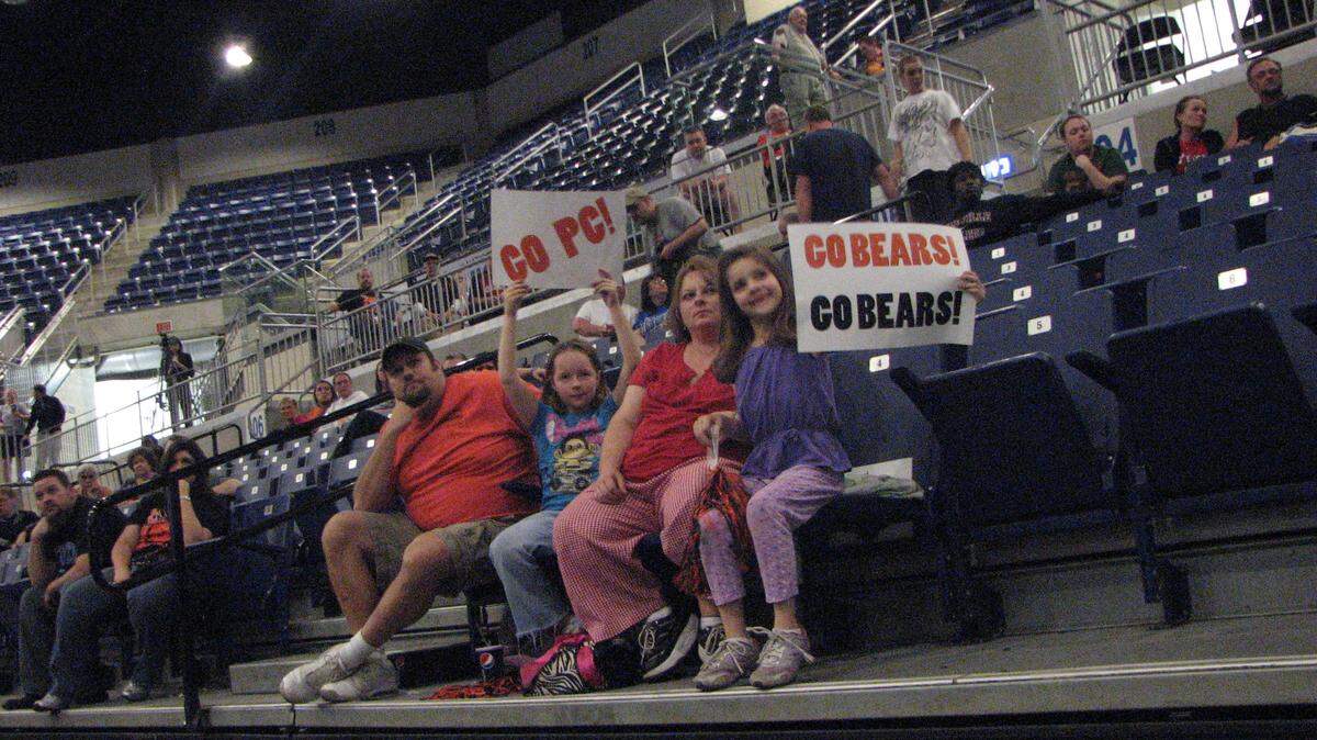 Aleigha Slone, 9, Barbi Jarrell and Ashleigh Kimble, 7, of Belfry joined students, staff and fans on Tuesday night to cheer on the Pikeville College Bears at a rally and viewing party for the NAIA championship game.  