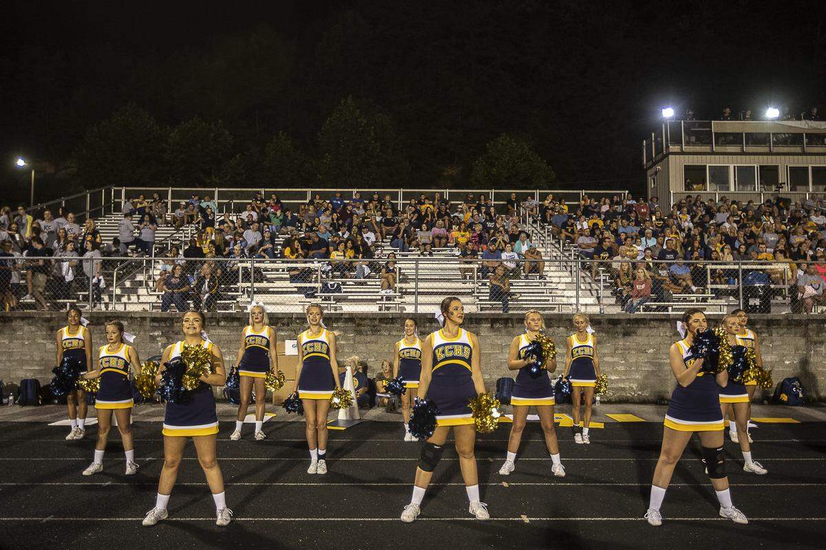 Knox Central cheerleaders and spectators watch second half action Friday.