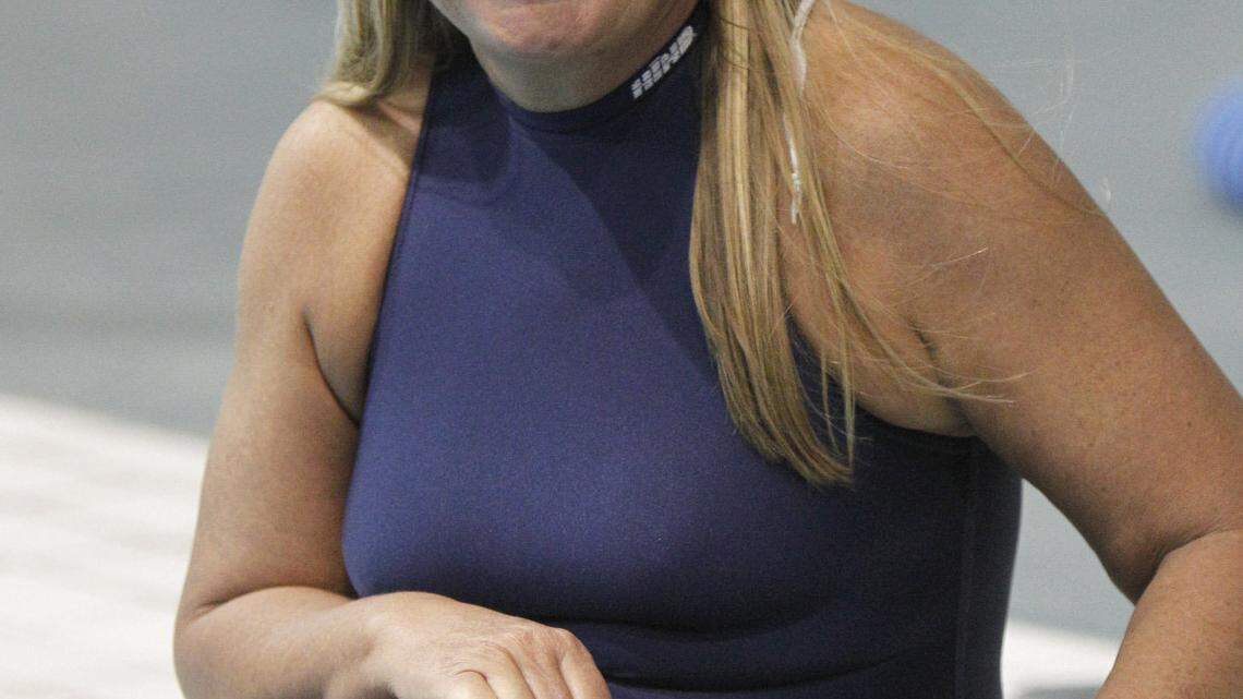Stephanie Schwabe posed for a portrait before her pool workout at UK's Lancaster Aquatic Center.  Schwabe, who teaches in the geology department at UK, is one of the 40 top cave divers in the world.  She dives for her research. She works out regularly to keep fit.  Photo by David Perry | Staff  