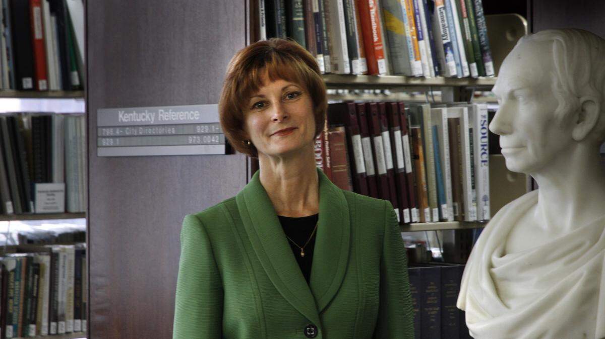 Director Ann Hammond shown in the Kentucky Reference Room on Thursday, Dec. 2, 2010 at the Lexington Public Library on Main St. in Lexington, Ky. (That’s a bust of Henry Clay at right.) Ann Hammond is settling in as the new director of the Lexington Public Library. Photo by David Perry | Staff.