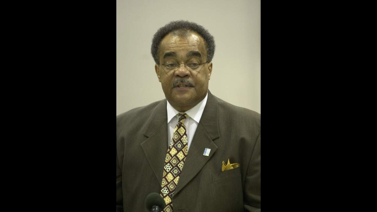 Rev. Bob Brown speaks as Fayette County leaders gather at Booker T. Washington Elementary School to announce the formation of a blue ribbon panel charged with finding ways to close the achievement gap in Lexington, Ky., on 3/28/02.
