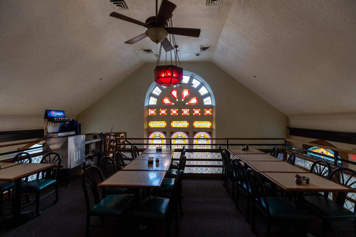 Stain glass windows of Joe Bologna’s Restaurant on Maxwell Street, August 17, 2021, which was built in 1891 as the Maxwell Street Presbyterian Church before being rededicated as a Jewish Synagogue, then as a restaurant in 1989.