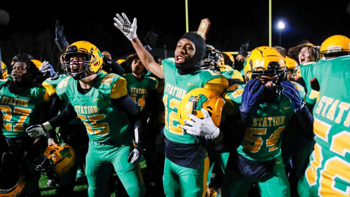 Kyzaun Butler (12) celebrates Bryan Station’s historic defeat of Trinity during the Class 6A quarterfinals in Lexington on Friday night.