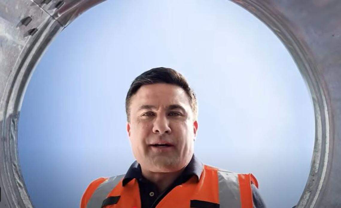 U.S. Senate candidate Nate Morris is framed by a trash can in his campaign commercial “Garbage Day.”