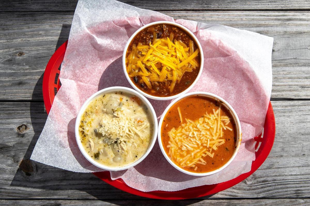 Chicken nori soup, clockwise from bottom left, three-bean chili and tomato basil soup at Dad’s Favorite Deli in Lexington, Ky. Thursday, March 18, 2021