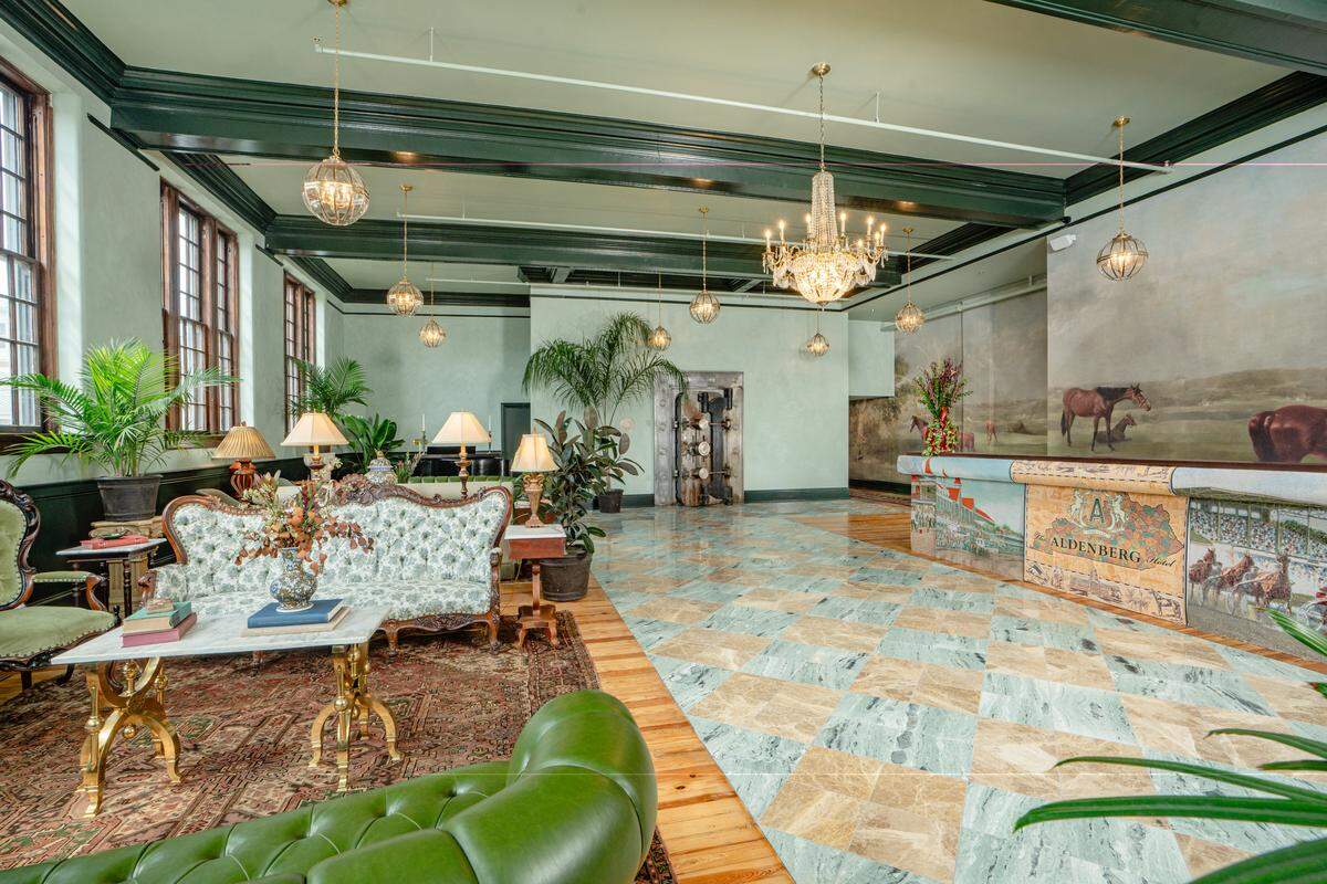 The lobby area of The Aldenberg Hotel, a new luxury boutique hotel in downtown Versailles, Ky. Located in the historic Woodford Bank and Trust building, the hotel uses the former bank vault as a gift shop. 